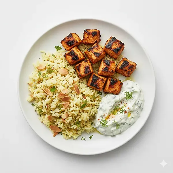 Al faham chicken breast with almond rice & dill tzatziki sauce