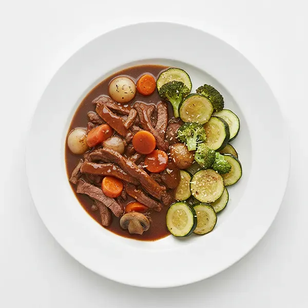 Beef bourguignon with herby veggies roasted with parmesan
