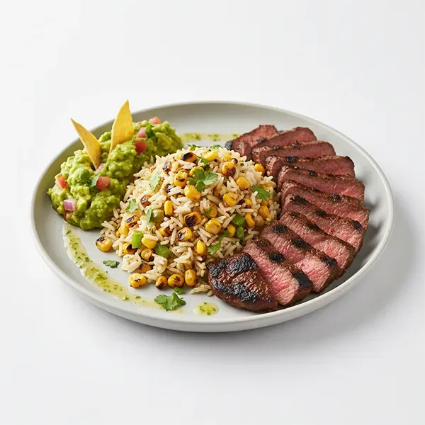 Citrus-Marinated Carne Asada with Charred Corn Rice & Guacamole