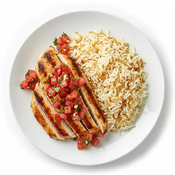 Grilled chicken with tamatim gremolata & egyptian rice