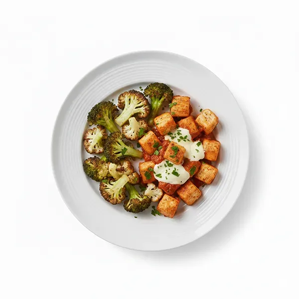 Mozzarella & gherkin chicken bake with garlic cream sauce & charred florets