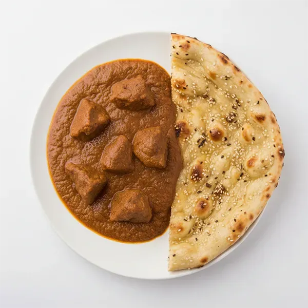 Mughlai red mutton masala with sesame naan