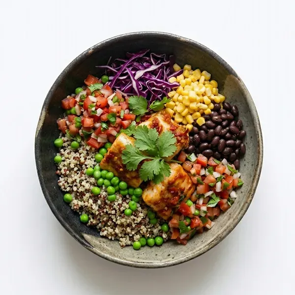 Spicy fish taco bowl with peas ,quinoa and salsa